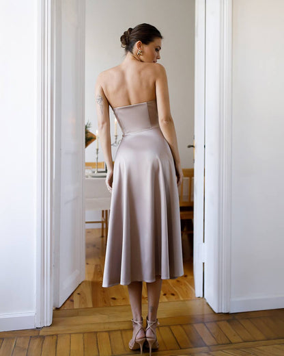 Elegant Beige Satin Dress with Corset and Flared Skirt for Parties or Weddings