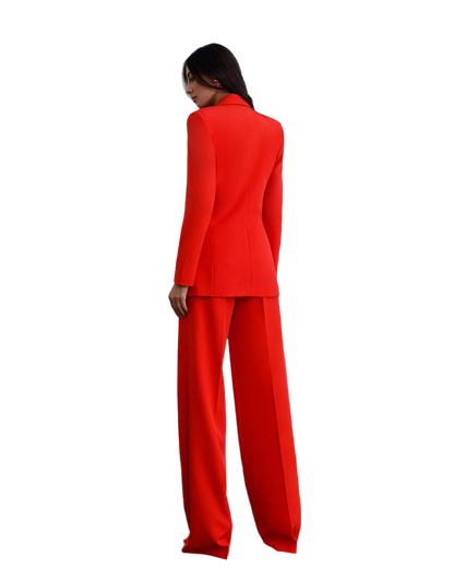 Person wearing a red suit on a white background