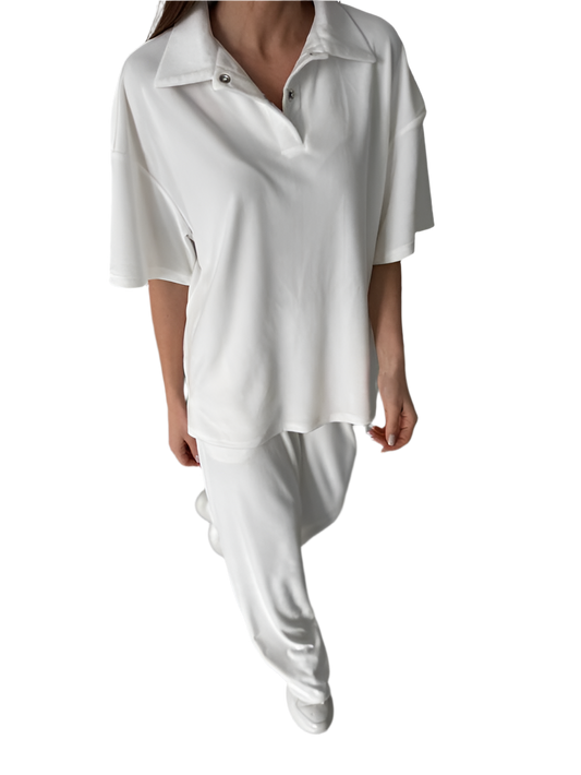 White outfit with a shirt and pants on a white background