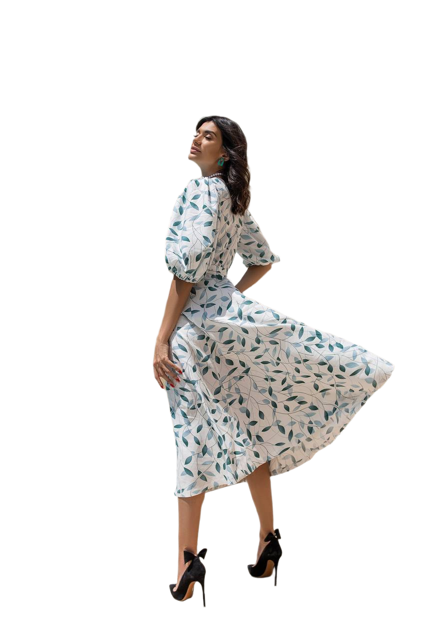 Woman wearing a floral dress on a white background