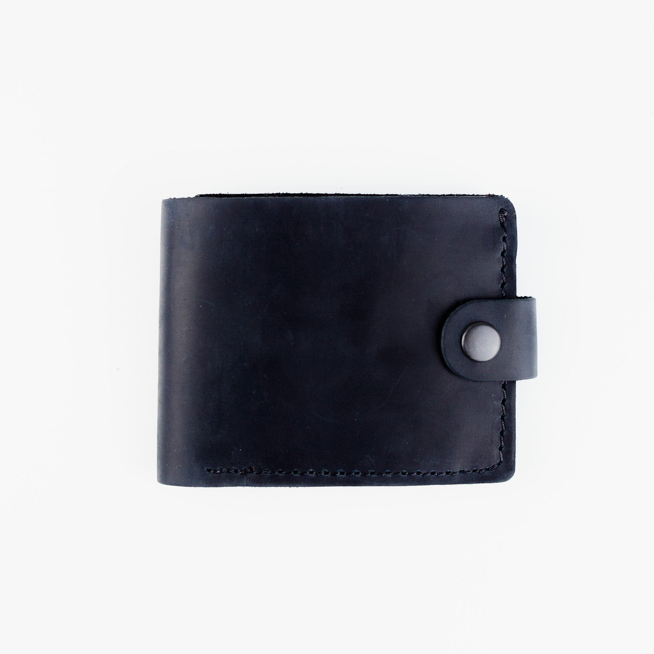 A black leather bifold wallet with a snap-button strap closure, shown closed on a plain white background.