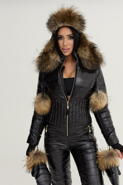 Person wearing a black leather outfit with fur accents on a plain background