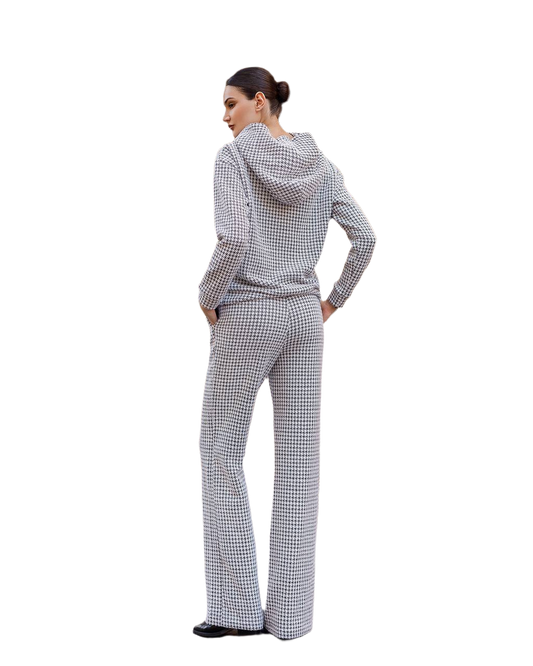 Person wearing a checkered outfit on a white background