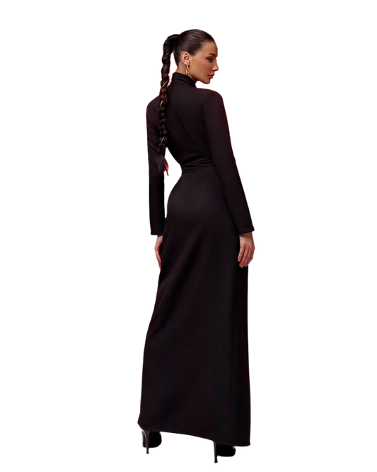 Woman wearing a long black dress on a white background