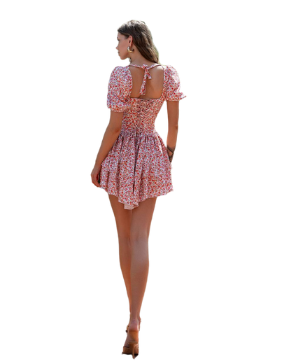 Woman wearing a floral dress on a white background