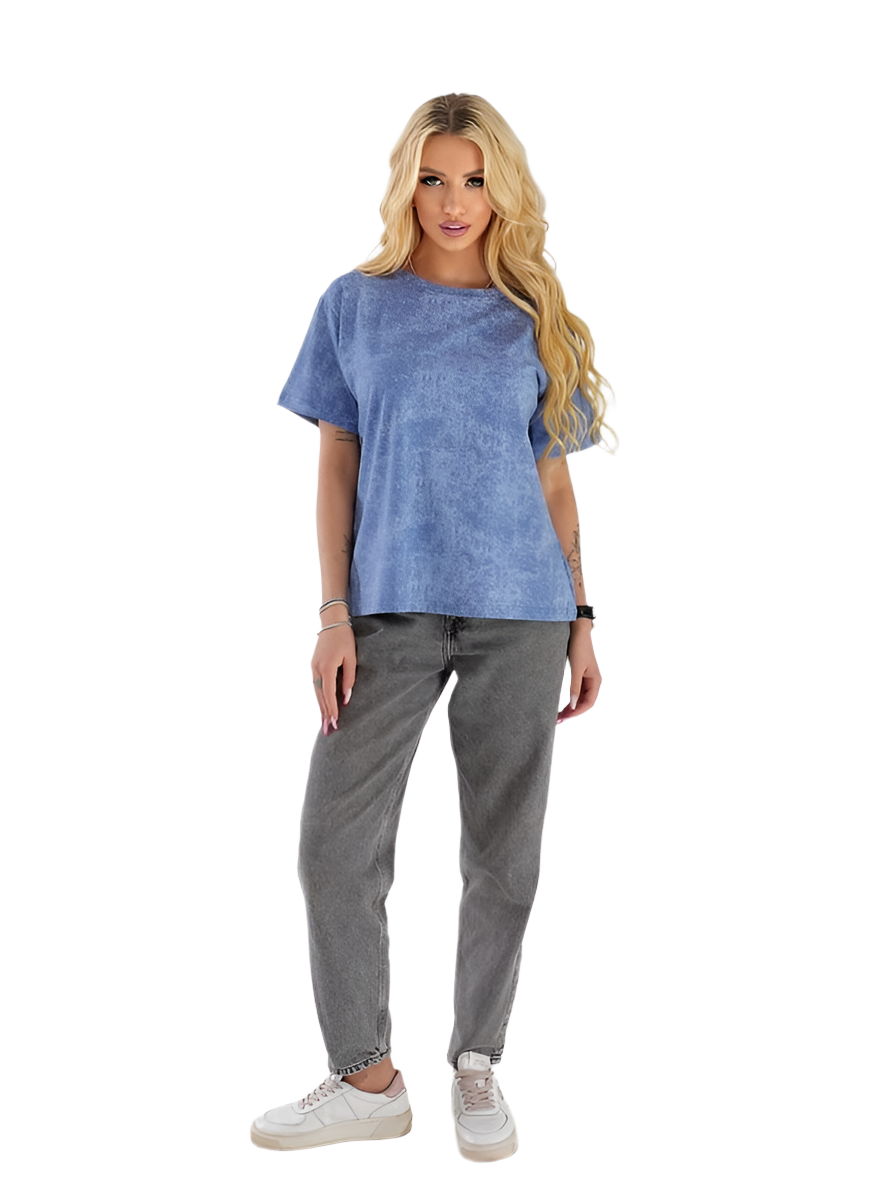 Woman wearing a blue t-shirt and gray pants on a white background