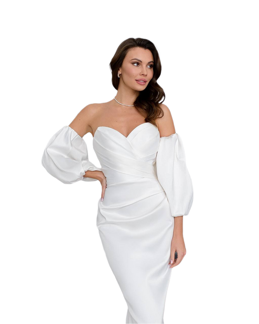 Woman wearing a white off-shoulder dress on a white background