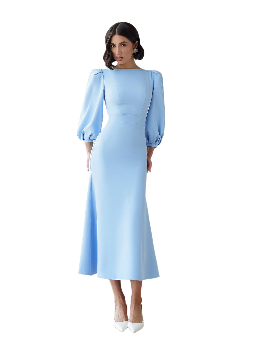 Woman wearing a light blue dress with puff sleeves on a white background