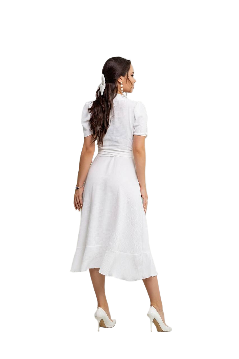 Woman wearing a white dress on a white background