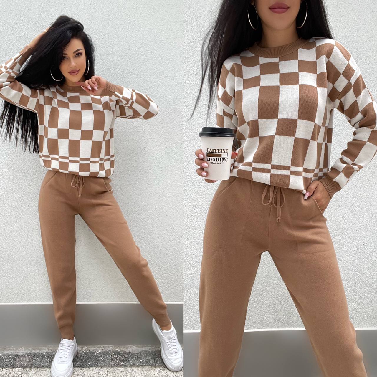 Two people wearing matching brown and white checkered outfits against a light gray wall.