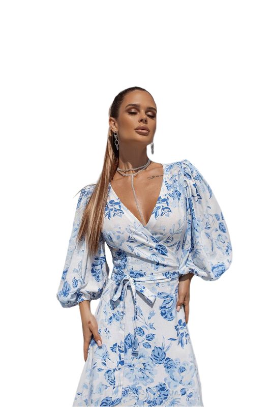 Woman wearing a blue floral dress on a white background