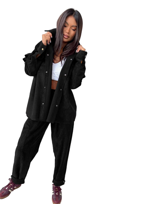 Stylish Black Velvet Two-Piece Suit with Ruffle Shirt and Snap-Fastened Pants