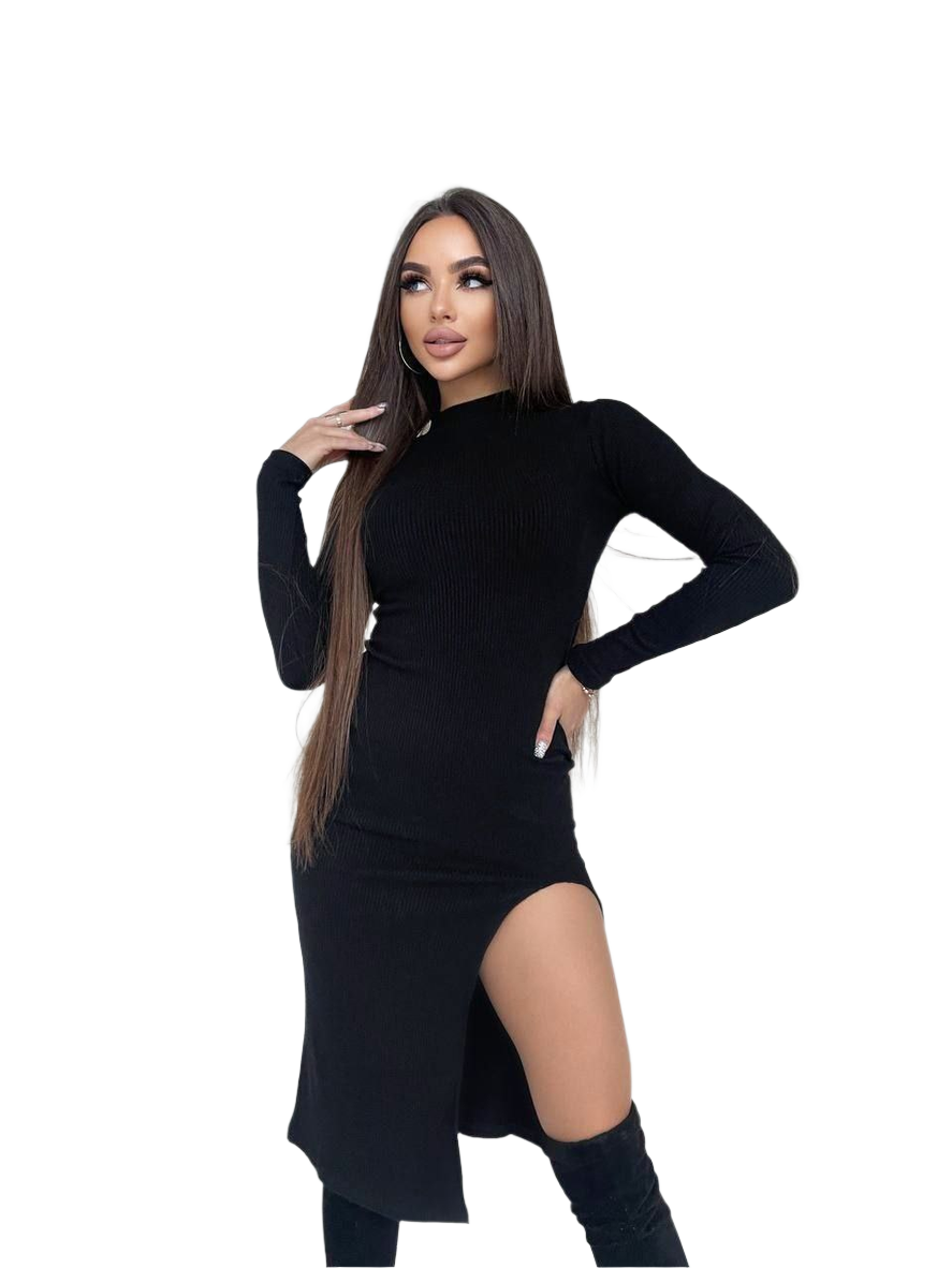 Woman wearing a black long-sleeve top and skirt on a white background