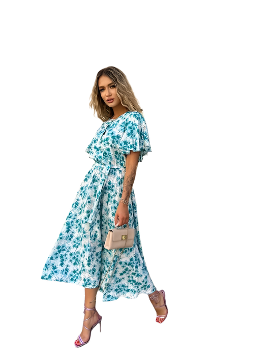 Woman wearing a blue floral dress on a white background