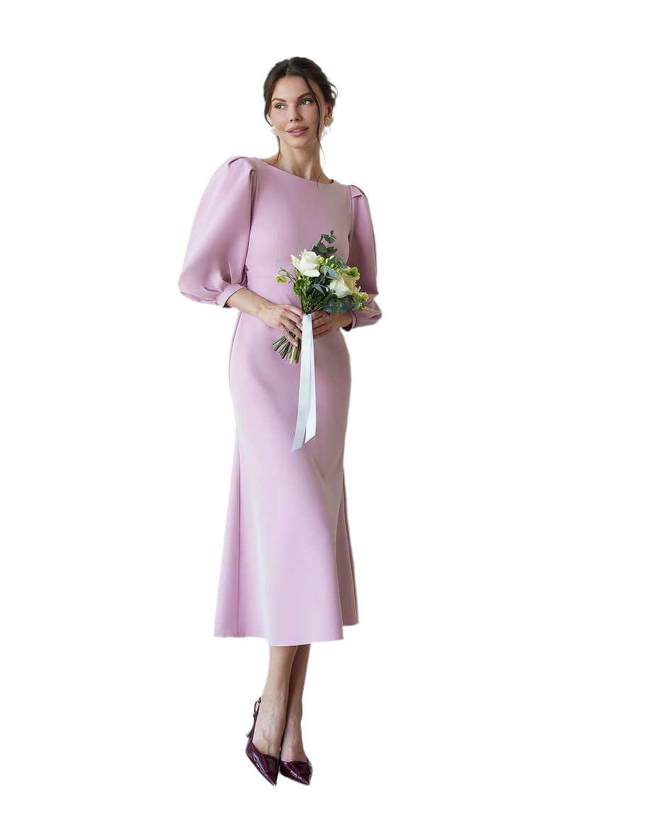 Woman in a pink dress holding flowers on a white background