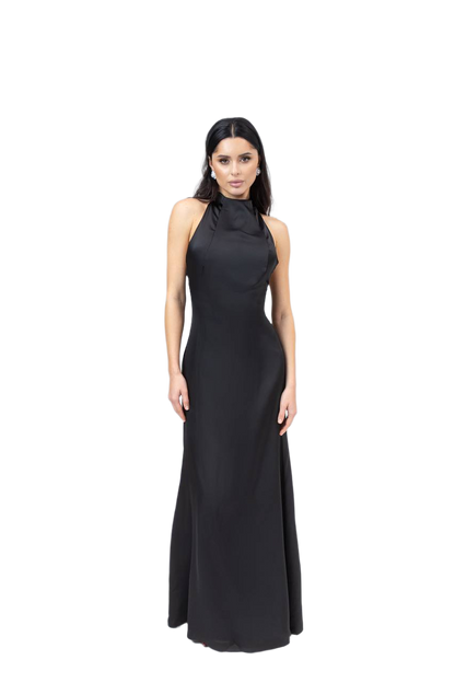 Woman wearing a black halter neck gown on a white background