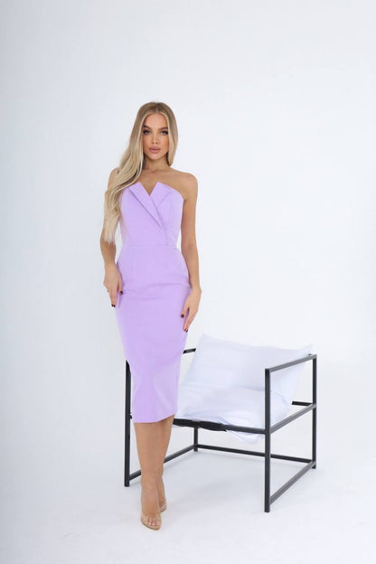 Woman wearing a lavender one-shoulder dress on a white background