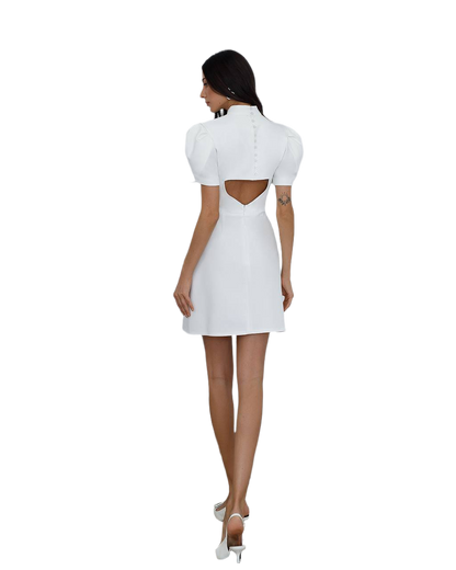 White dress with cut-out back on a white background