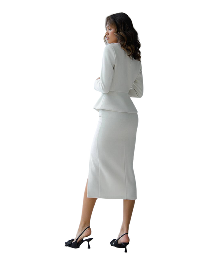 Woman wearing a white suit on a white background