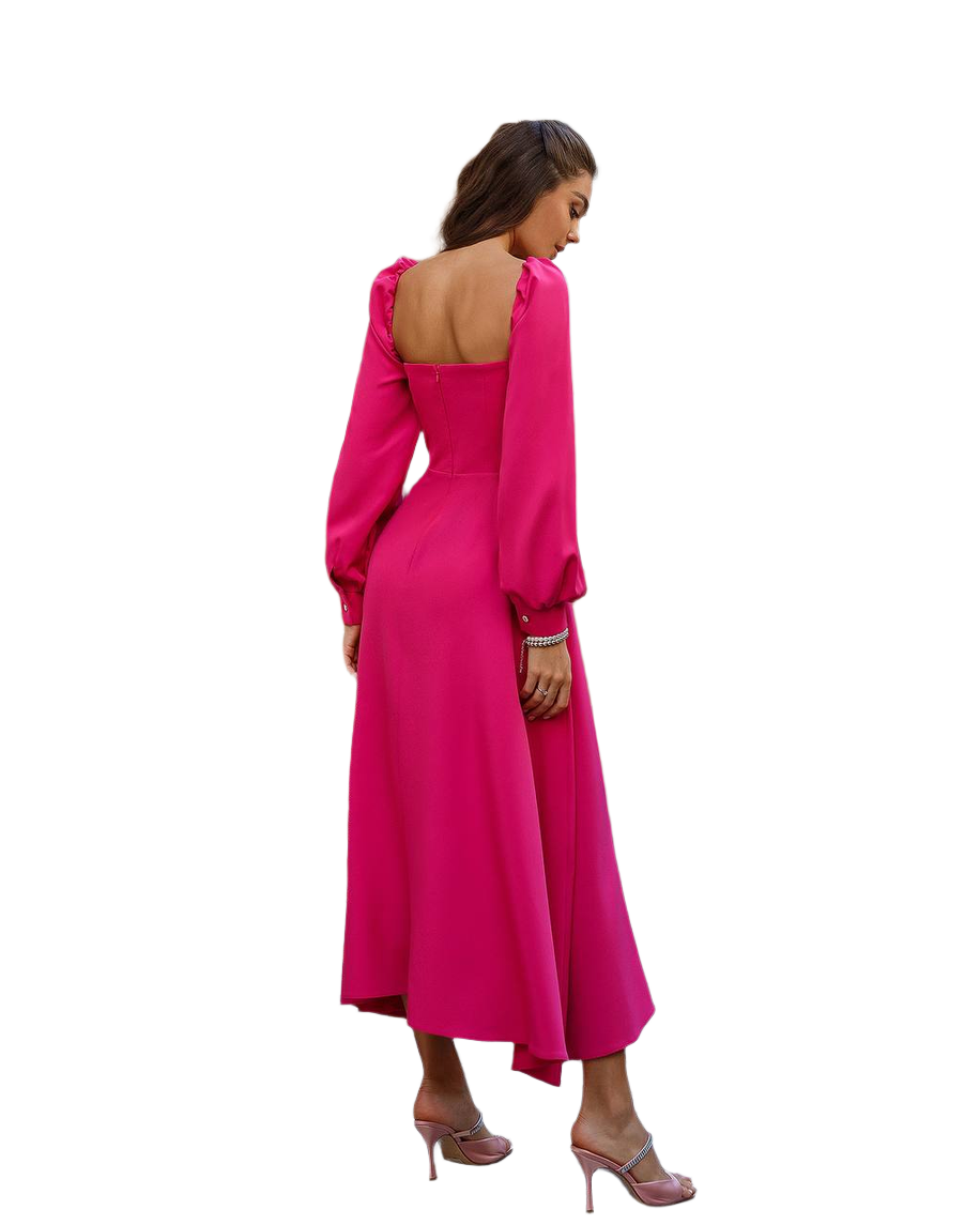 Woman wearing a bright pink dress with long sleeves on a white background