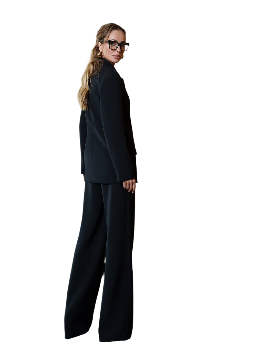 Person wearing a black suit on a white background