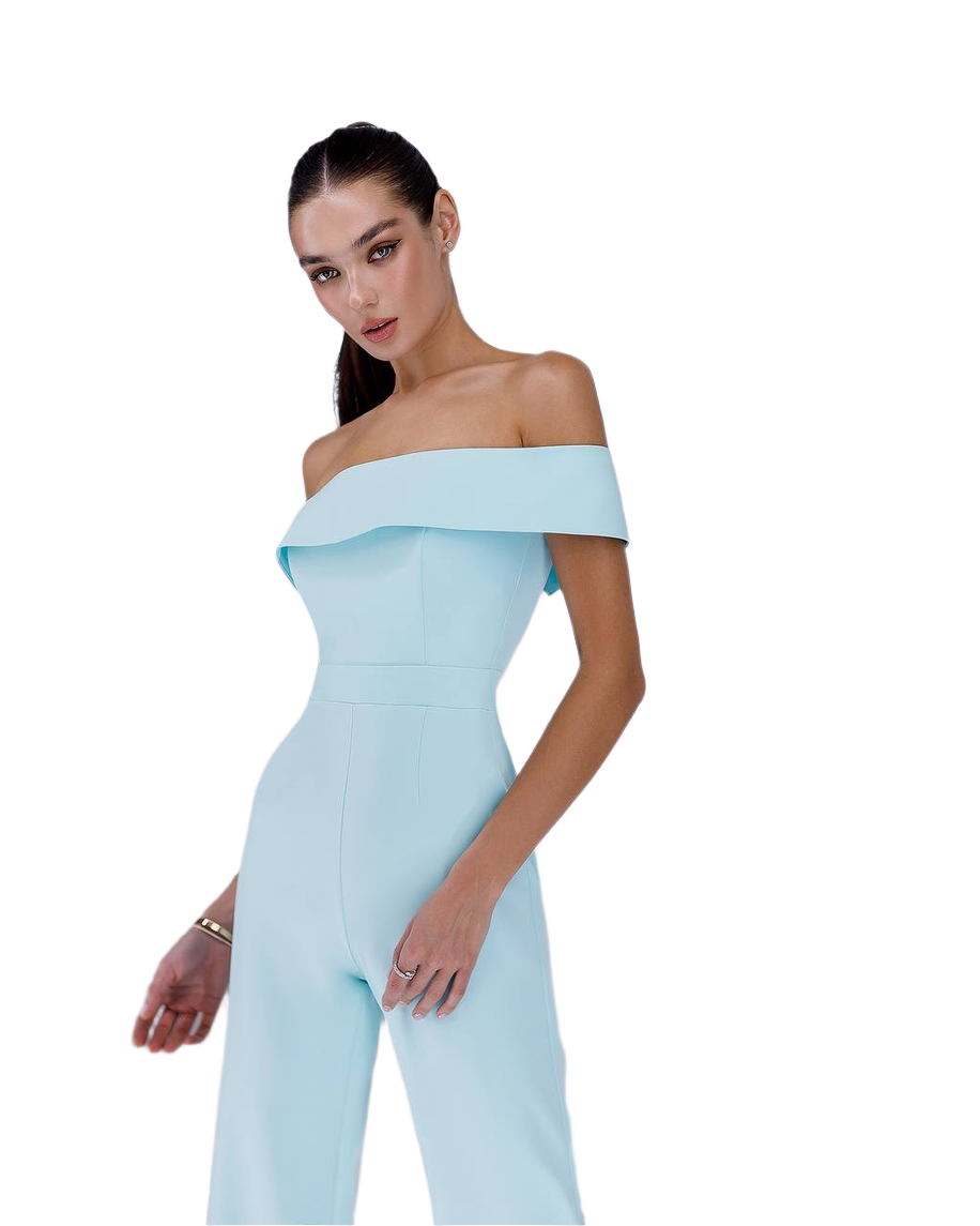 Woman wearing a light blue off-shoulder jumpsuit on a white background