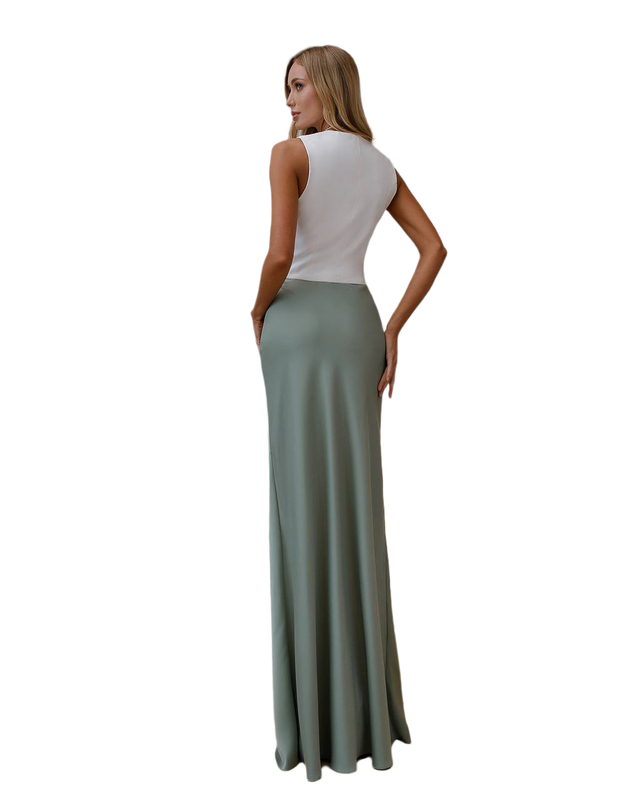 Woman wearing a white top and green skirt on a white background