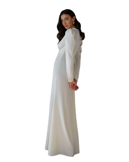 Woman wearing a long white dress on a white background