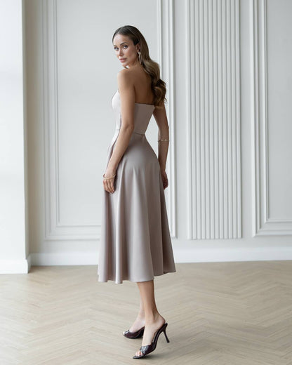 Elegant Beige Satin Dress with Corset and Flared Skirt for Parties or Weddings