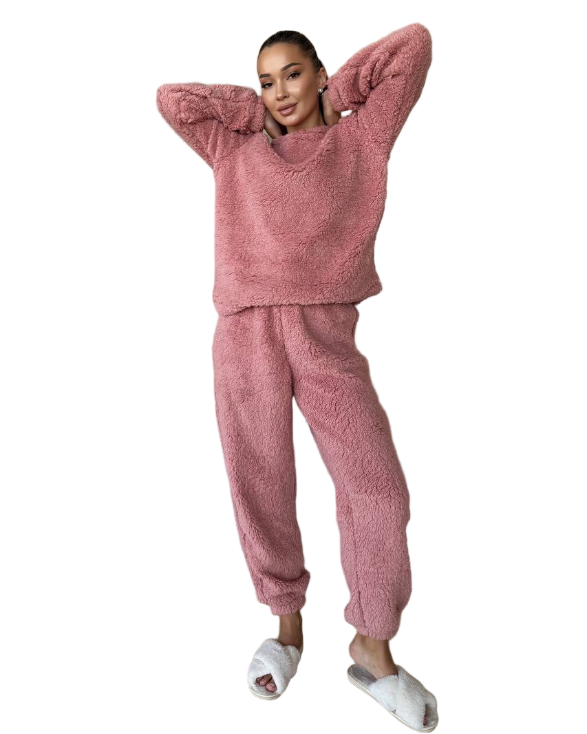Person wearing a pink textured loungewear set on a white background