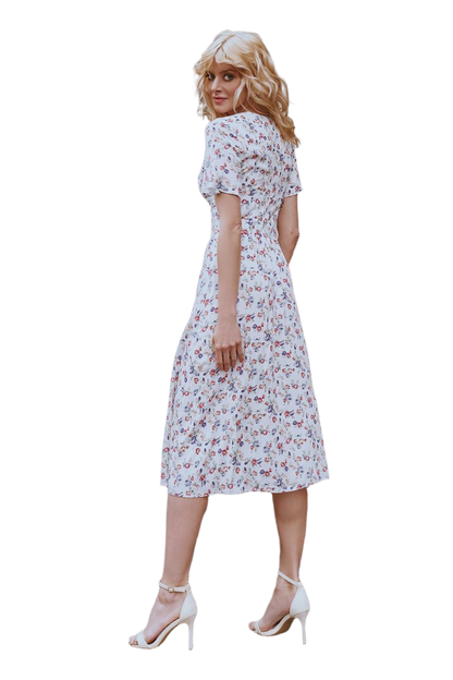 Woman wearing a floral dress on a white background