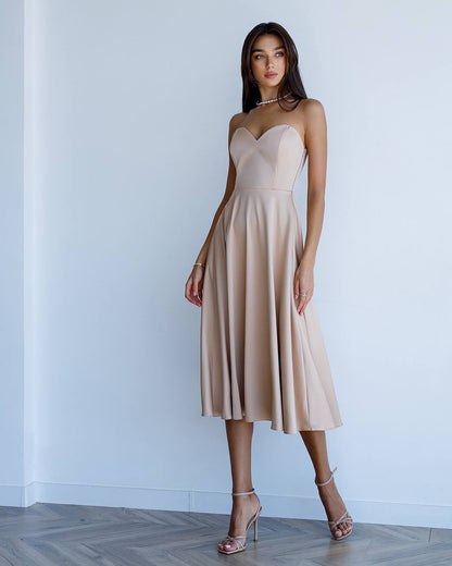Elegant Beige Satin Dress with Corset and Flared Skirt for Parties or Weddings