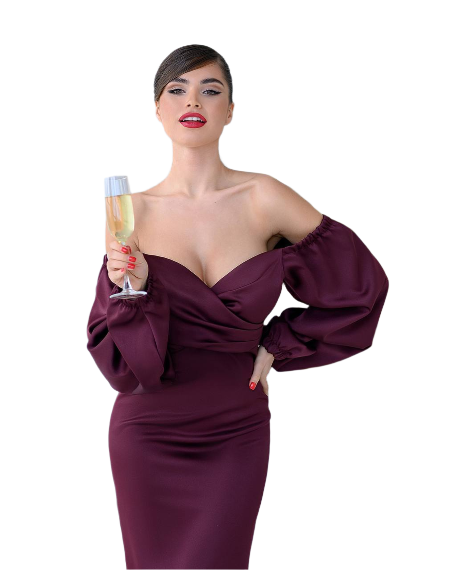 Woman in a burgundy evening gown holding a glass of champagne on a white background