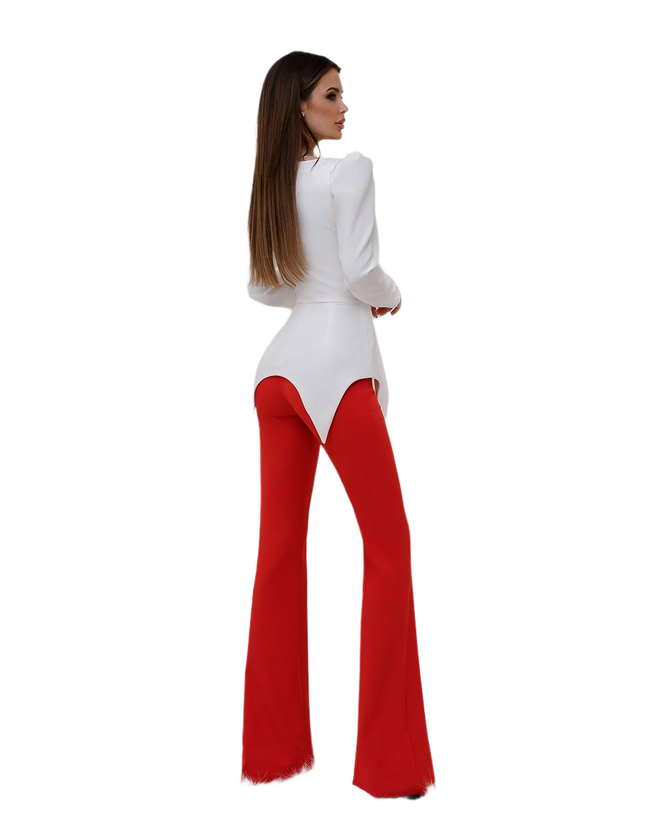 Woman wearing a white top and red flared pants on a white background