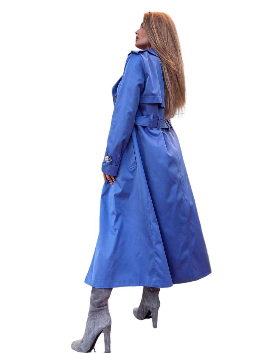 Woman wearing a blue trench coat on a white background