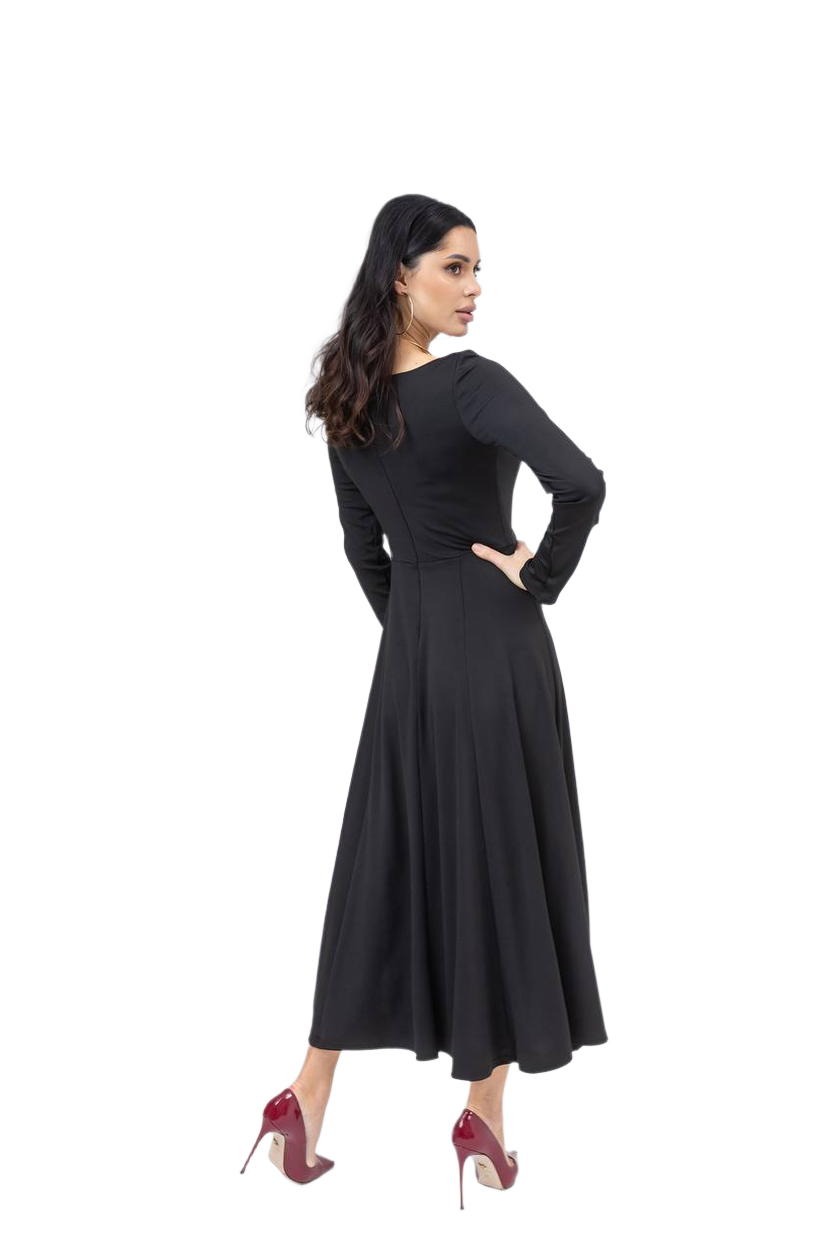 Woman wearing a black dress on a white background