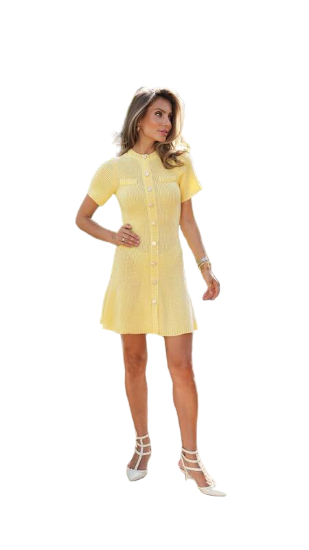 Woman wearing a yellow dress on a white background