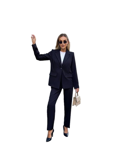 Woman in a black suit with sunglasses and a handbag on a white background