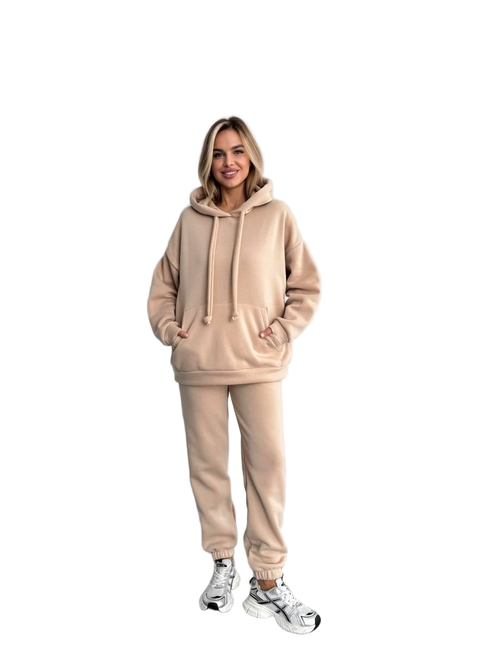 Woman wearing a beige hoodie and jogger set on a white background