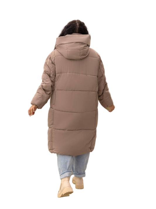 Person wearing a long brown puffer coat on a white background