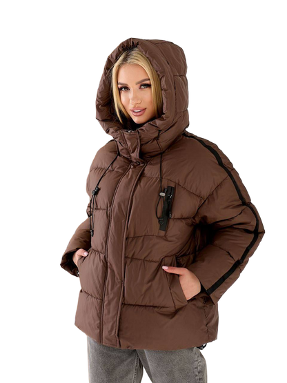Woman wearing a brown winter coat with a hood on a white background