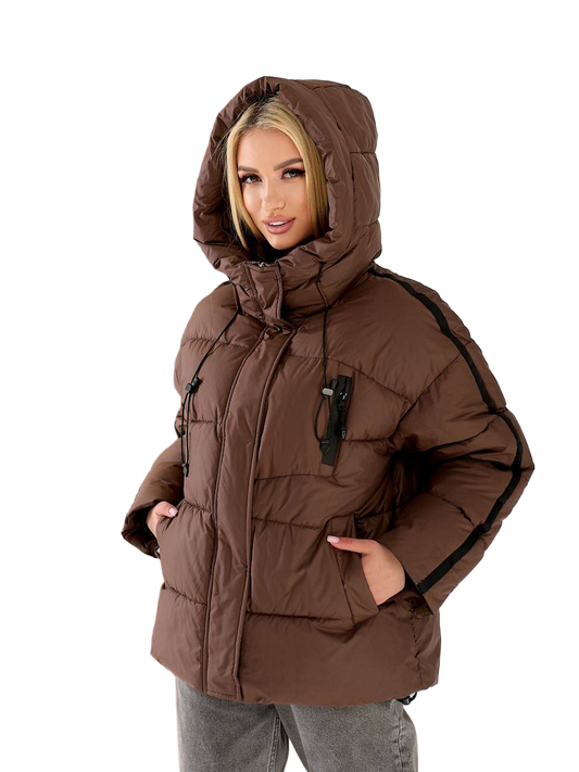 Woman wearing a brown winter coat with a hood on a white background