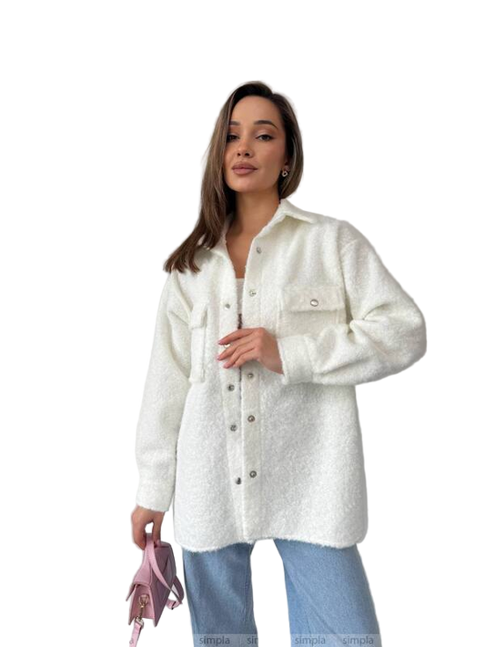 Woman wearing a white button-up shirt on a white background