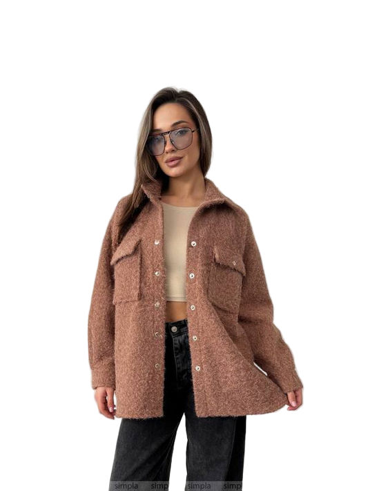 Woman wearing a brown coat on a white background