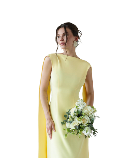 Woman in a yellow dress holding a bouquet of flowers on a white background