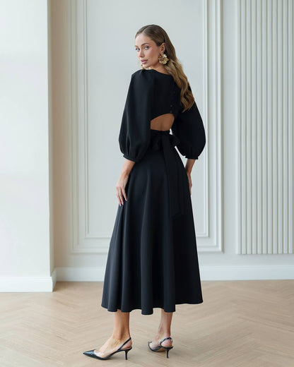 Elegant Midi Dress with Puff Sleeves and Cutout Back in Black