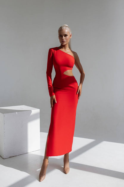 Woman wearing a red one-shoulder dress with cut-out design against a white background