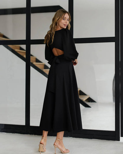 Elegant Midi Dress with Puff Sleeves and Cutout Back in Black