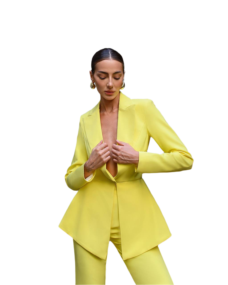 Woman wearing a bright yellow suit on a white background