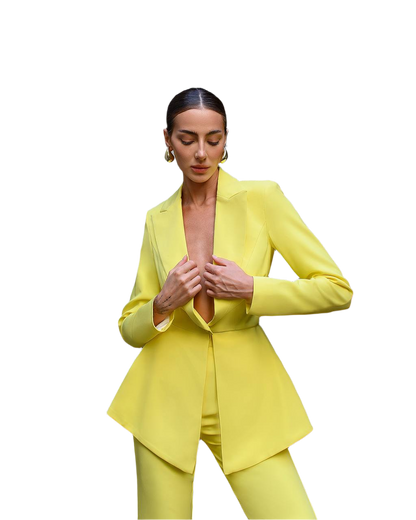 Woman wearing a bright yellow suit on a white background